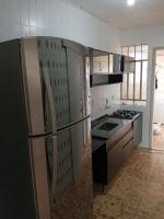 Kuchyň nebo kuchyňský kout v ubytování Quarto próximo ao shopping Moinhos