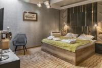 Posteľ alebo postele v izbe v ubytovaní Malinowy Dwór Hotel Medical SPA
