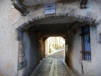 an alley with a sign that reads pray not to migrate at Apartment Domaine de Roquebrune by Interhome in La Rouviere