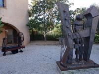 a statue of a man playing a harp at Apartment Domaine de Roquebrune by Interhome in La Rouviere