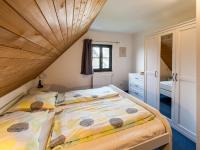Postel nebo postele na pokoji v ubytování Holiday Home Holiday Hill 55 by Interhome