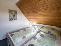Postel nebo postele na pokoji v ubytování Holiday Home Holiday Hill 55 by Interhome
