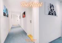 a hallway with a sign that reads the hotel at Hotel Bad Hofgastein - The STORKS - Adults Only in Bad Hofgastein