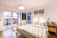 Postel nebo postele na pokoji v ubytování Apartmán V medvědím brlohu