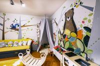 Postel nebo postele na pokoji v ubytování Apartmán V medvědím brlohu