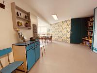 a kitchen and dining room with a table and chairs at Gite pour pros entre Niort et Fontenay &#47; Tout compris in Benet