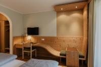 Postel nebo postele na pokoji v ubytování Parkhotel Matrei
