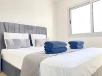 Postel nebo postele na pokoji v ubytování Sunset Pearl Holiday Apt. - Ayia Napa
