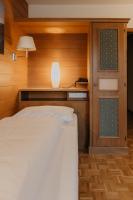 Postel nebo postele na pokoji v ubytování Parkhotel Matrei