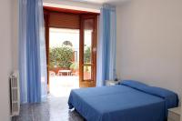 A bed or beds in a room at Residence Le Villette