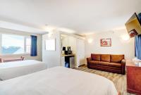 Atlantic Oceanfront Hotel, Wells Beachにあるベッド