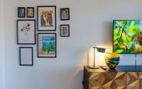 A television and/or entertainment centre at Newly Renovated Apartment with Amazing View