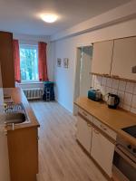 Kuchyň nebo kuchyňský kout v ubytování Apartmenthaus Hartl