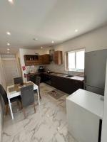 A kitchen or kitchenette at 2 Bedroom Apartment in Msida, Malta