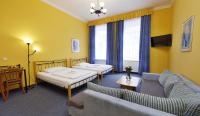 Postel nebo postele na pokoji v ubytování Hotel Boston