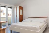 Posteľ alebo postele v izbe v ubytovaní Apartments Glorija