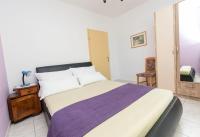 Posteľ alebo postele v izbe v ubytovaní Apartments Glorija