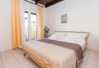 Posteľ alebo postele v izbe v ubytovaní Apartments Glorija