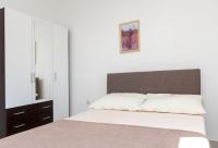 Posteľ alebo postele v izbe v ubytovaní Apartments Glorija