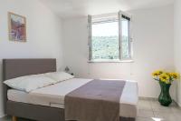 Posteľ alebo postele v izbe v ubytovaní Apartments Glorija