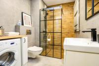 Kúpeľňa v ubytovaní River House - J&D Apartamenty