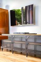 Televízia a/alebo spoločenská miestnosť v ubytovaní River House - J&D Apartamenty