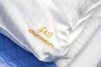Posteľ alebo postele v izbe v ubytovaní River House - J&D Apartamenty