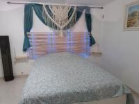 Łóżko lub łóżka w pokoju w obiekcie Châteaudouble : appartement au calme