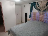 Łóżko lub łóżka w pokoju w obiekcie Châteaudouble : appartement au calme