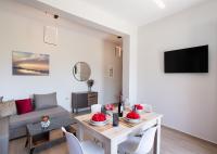 TV a/nebo společenská místnost v ubytování Ruellia Luxury Apartments