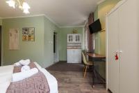 Postel nebo postele na pokoji v ubytování Villa Kaja Bansko
