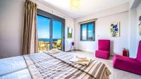 Posteľ alebo postele v izbe v ubytovaní Anemon Villas