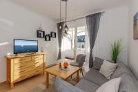 TV a/nebo společenská místnost v ubytování Apartment-Residenz Ostseestrand Apartment-Residenz Ostseestrand 21