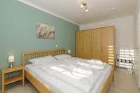 Postel nebo postele na pokoji v ubytování Apartment-Residenz Ostseestrand Apartment-Residenz Ostseestrand 21