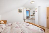 Posteľ alebo postele v izbe v ubytovaní Holiday Home & Spa Kozji Vrh