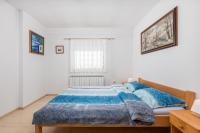 Posteľ alebo postele v izbe v ubytovaní Holiday Home & Spa Kozji Vrh