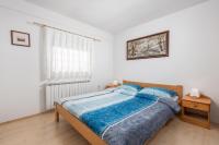 Posteľ alebo postele v izbe v ubytovaní Holiday Home & Spa Kozji Vrh