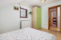 Posteľ alebo postele v izbe v ubytovaní Holiday Home & Spa Kozji Vrh