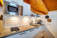 Kuchyňa alebo kuchynka v ubytovaní Mountain Residence Kasern Nr 5