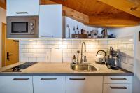 Kuchyňa alebo kuchynka v ubytovaní Mountain Residence Kasern Nr 5