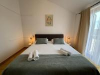 Posteľ alebo postele v izbe v ubytovaní Room accomodation Jezera Lovišća