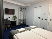 Posteľ alebo postele v izbe v ubytovaní Garbarska 22 Aparthotel
