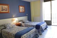 Posteľ alebo postele v izbe v ubytovaní Hotel Parras Arnedillo