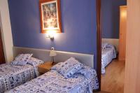 Posteľ alebo postele v izbe v ubytovaní Hotel Parras Arnedillo