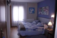 Posteľ alebo postele v izbe v ubytovaní Hotel Parras Arnedillo