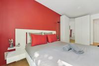 Łóżko lub łóżka w pokoju w obiekcie Appartement design pour les amateurs de modernité