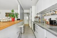Kuchnia lub aneks kuchenny w obiekcie Appartement design pour les amateurs de modernité