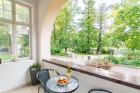Vonkajšia záhrada v ubytovaní Park Apartment (Parkowy) Happy Hours