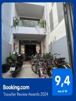 a group of bikes parked in front of a building at WELKOM INN in Can Tho
