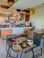 a table with plates of food on it in a kitchen at The Kasih Villas & Spa in Seminyak